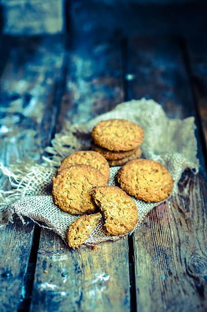 istock Vintage oatmeal cookies on rustic wooden background 477193985