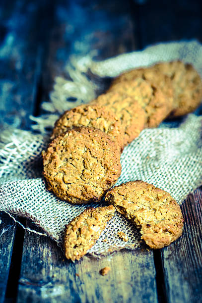 istock Vintage oatmeal cookies on rustic wooden background 477193997