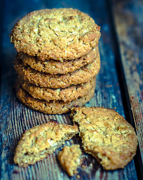 istock Vintage oatmeal cookies on rustic wooden background 477197667