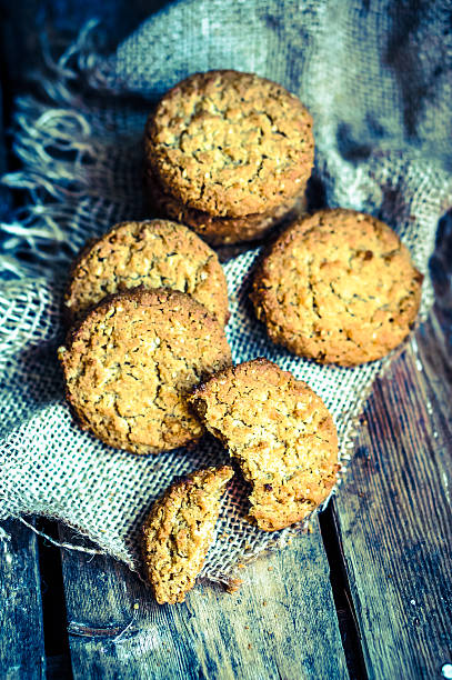 istock Vintage oatmeal cookies on rustic wooden background 477198769