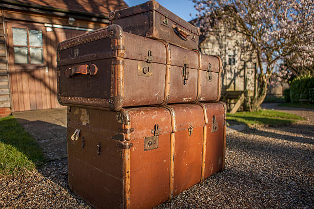Trunks and suitcases from the world war two period in England shot outdoors in Surrey, England on a sunny English evening.