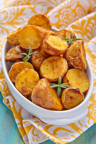 istock Oven baked potatoes with rosemary 477199554