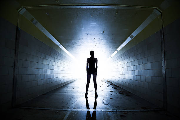 istock Female athlete posing in a tunnel 477199658