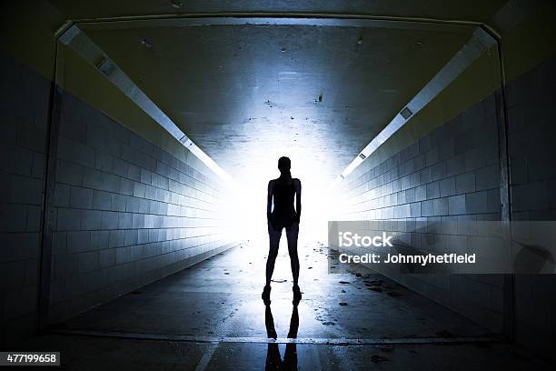 Female Athlete Posing In A Tunnel Stock Photo - Download Image Now - Stadium, Tunnel, Athlete