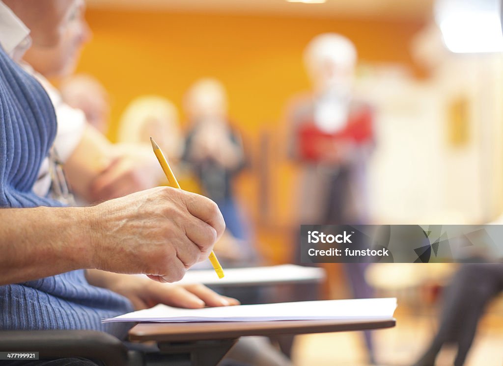 Senior adult education and support group in a meeting Active Seniors Stock Photo