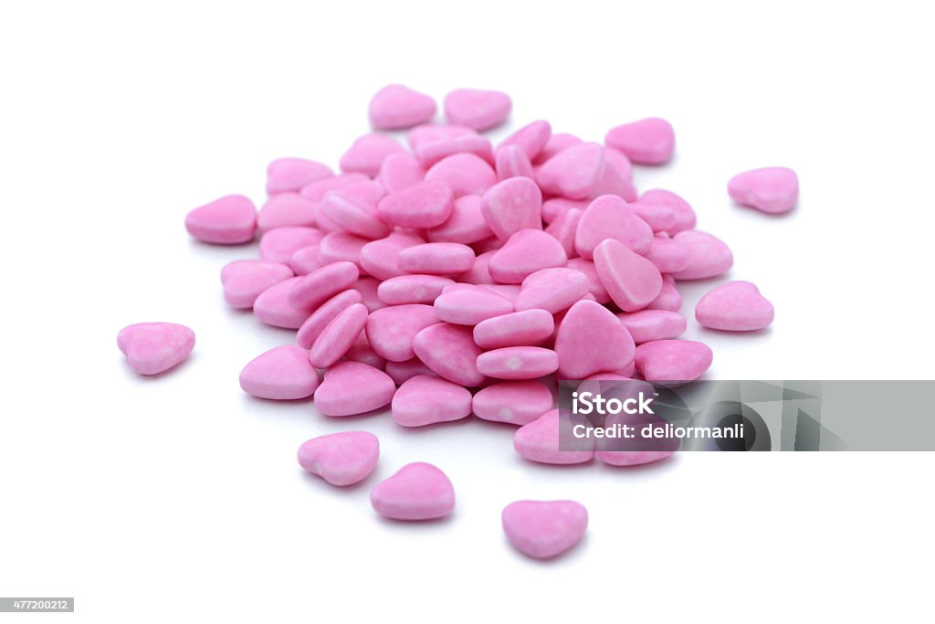 Pink candies on white background 2015 Stock Photo
