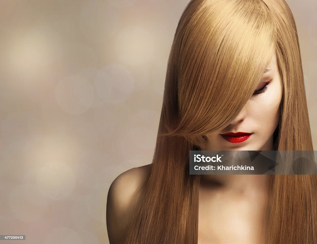 beautiful young woman with elegant long shiny hair closeup portrait of a beautiful young woman with elegant long shiny hair Shiny Stock Photo