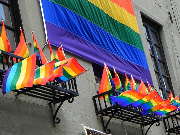 istock Gay Pride Flags Hanging Outside Building 477202632