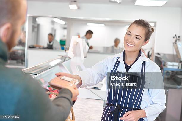 Working At The Butchers Shop Stock Photo - Download Image Now - Butcher's Shop, Butcher, Meat Packing Industry