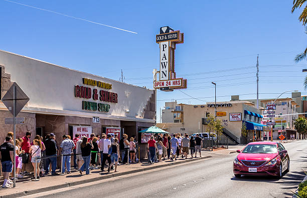 Las Vegas, USA - April 1, 2011: Tourists waiting in the line to visit Gold and Silver Pawn Shop. The Gold and Silver Pawn Shop is the actual location where History Channel's reality TV show 