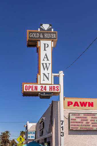 Las Vegas, USA - April 1, 2011: Gold and Silver Pawn Shop with blue sky. The Gold and Silver Pawn Shop is the actual location where History Channel's reality TV show 