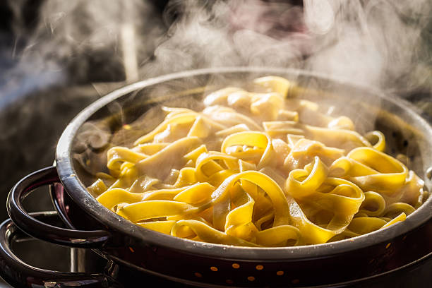 Steaming strainer of noodles stock photo