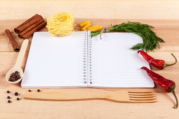istock Baking ingredients for cooking and notebook for recipes. 477206640