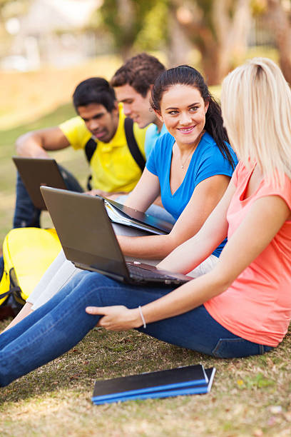 istock college students relaxing outdoors 477207973