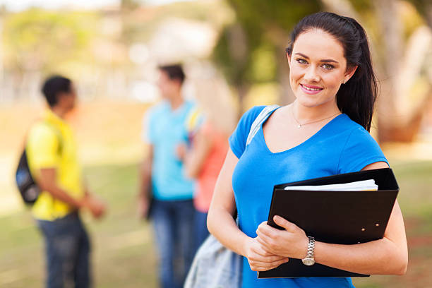 istock college girl on campus 477209865