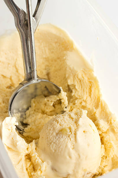 istock Rum raisin icecream in a box with scooper. 477210114