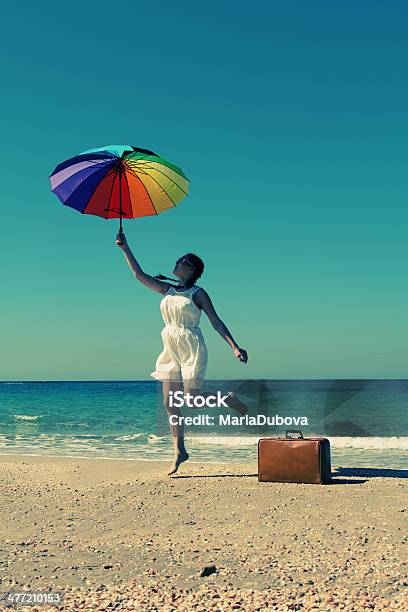 Beautiful Model Holding Umbrella Stock Photo - Download Image Now - Adult, Adults Only, Beach