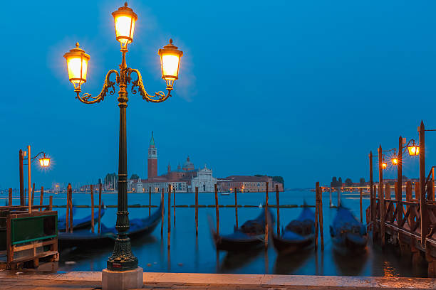 istock Gondolas at twilight in Venice lagoon, Italia 477210224