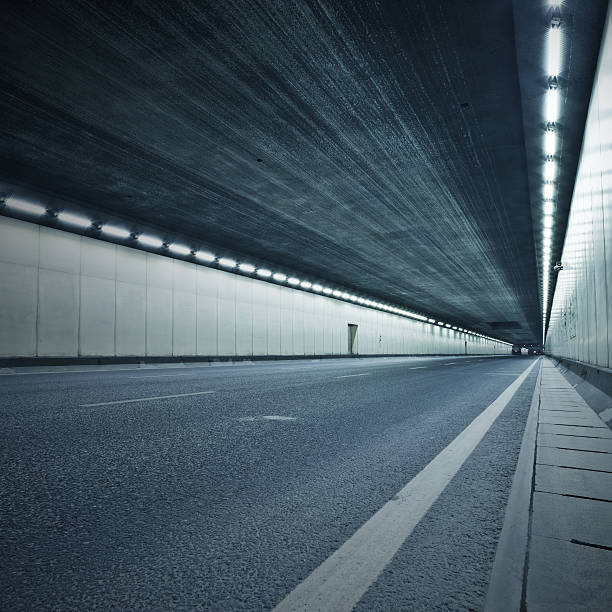 istock The tunnel at night, lights formed a line. 477210729
