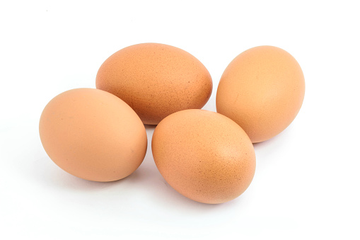 four eggs  on  white background