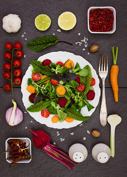 istock Mixed salad with salad ingredients 477214200