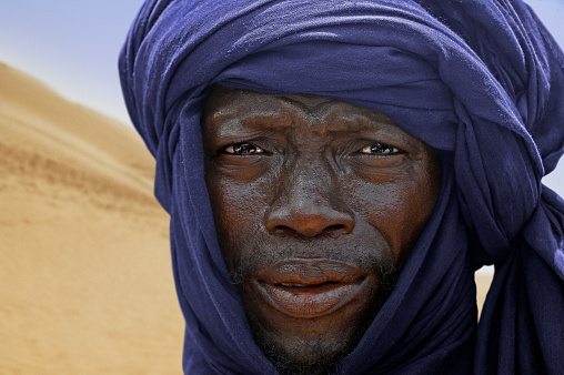 Timbuktu, Mali - september - 02 - 2011 Tuareg with blue turban in the desert near the city of Timbuktu in Mali 