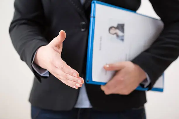 Photo of Woman with curriculum vitae