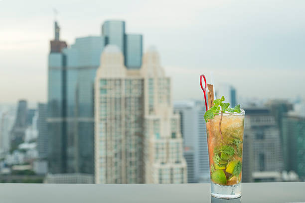 istock Mojito cocktail on table in rooftop bar 477224110