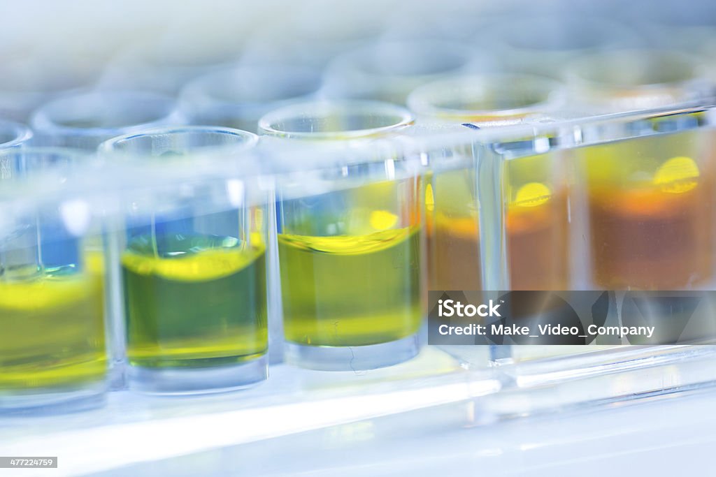 Assay plate 96 well with colourful buffer Plate for chemical analysis such as antioxidant tests with different concentrations 80-89 Years Stock Photo