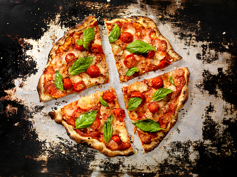 Margherita Pizza with Fresh Mozzarella,Tomatoes and Basil - Photographed on a Hasselblad H3D11-39 megapixel Camera System