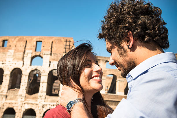 istock Tourist flirting in rome at coliseum 477227382