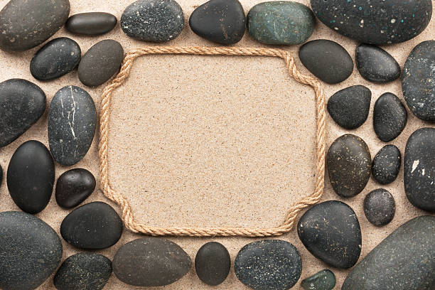 istock Pointer made of rope with black stones 477236504
