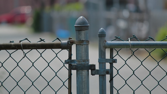 Close up of chain link fence gate.