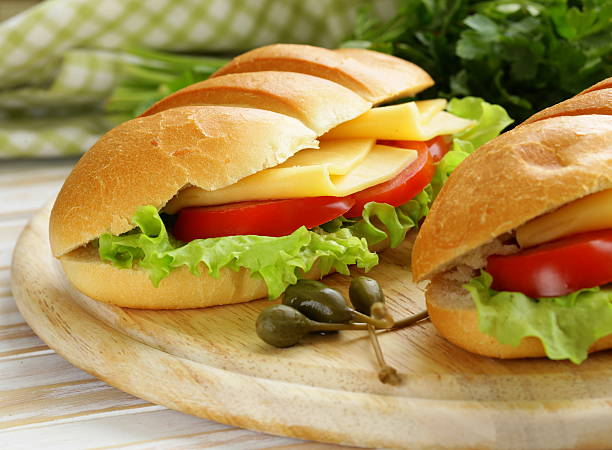 istock Fresh sandwich with vegetables, green salad and cheese 477245761