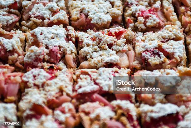 Cut Rhubarb Cake Sprinkled With Powdered Sugar Stock Photo - Download Image Now - Rhubarb, Cake, Square Shape