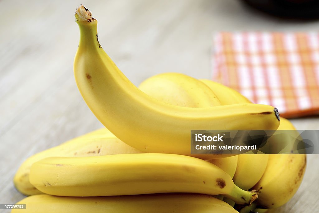 Bananas Bananas on a wooden table Banana Stock Photo