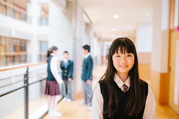 istock Japanese high school. Young student, three friends in the background 477252498
