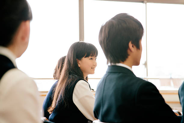 istock High school students, in a classroom, Japan. Smiling 477252572