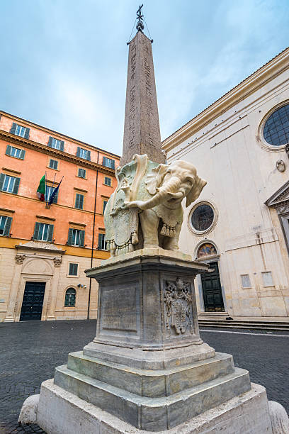 istock Egyptian obelisk caried by an elephant in Rome 477252829