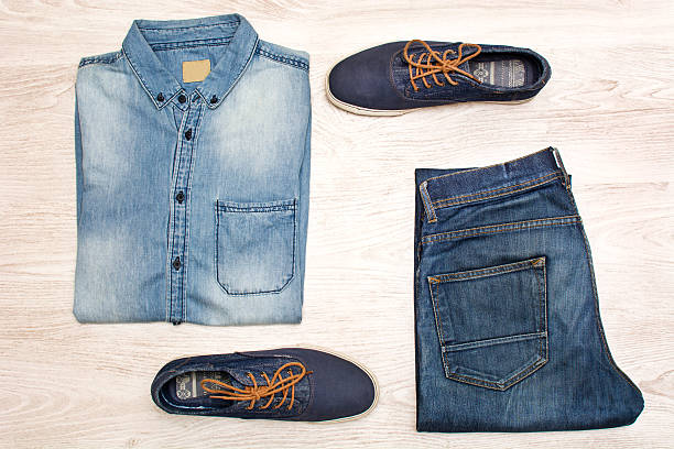 istock jean clothes on wood 477255054
