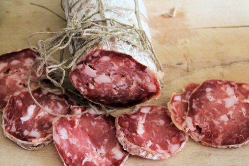 traditional sliced meat  salami on wooden board