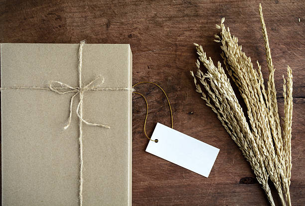 istock brown paper box on old wood background 477260602
