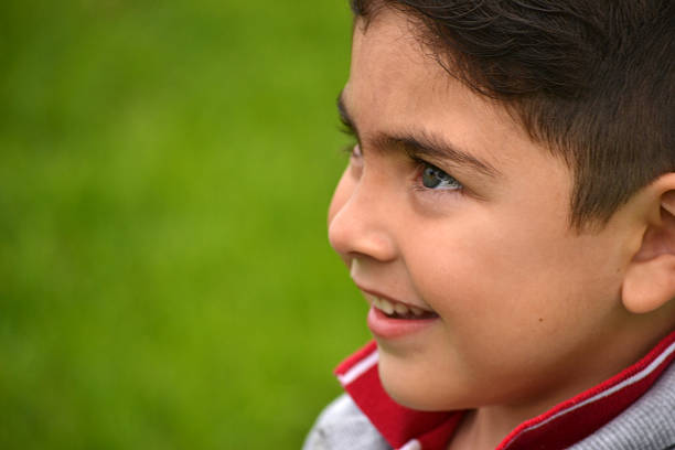 istock Child playing in the park 477263851