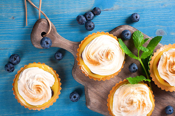 istock Mini lime curd tartlets with meringue. 477284742