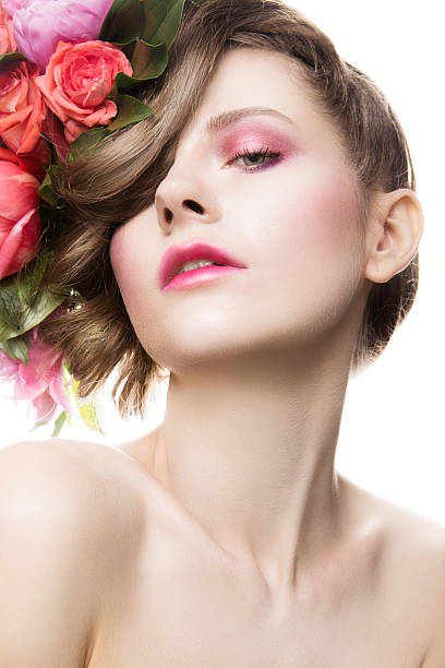 istock Beautiful lady with a wreath of flowers 477293000