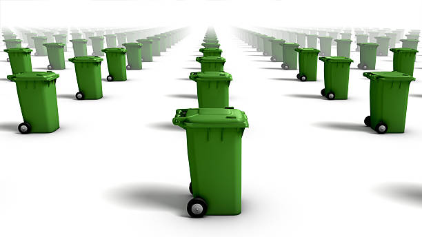Side view of trash cans (green) stock photo
