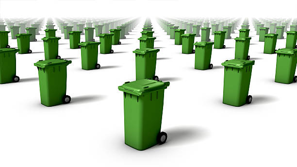 Diagonal view of trash cans (green) stock photo