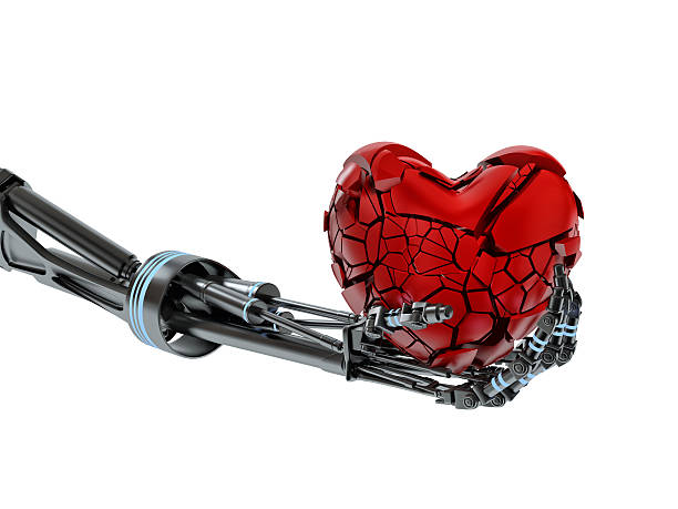 istock broken heart in hand of robot on white background 477305062