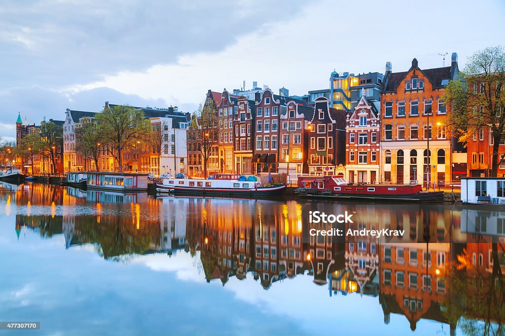 Night city view of Amsterdam, the Netherlands Night city view of Amsterdam, the Netherlands with Amstel river Amsterdam Stock Photo
