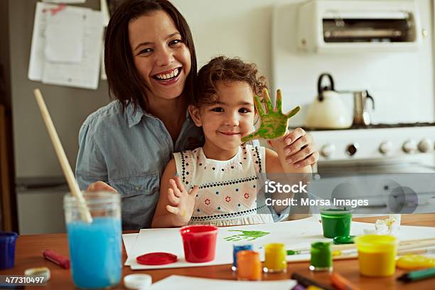 Portrait Of Mother And Daughter Painting Stock Photo - Download Image Now - Child, Mother, Playful